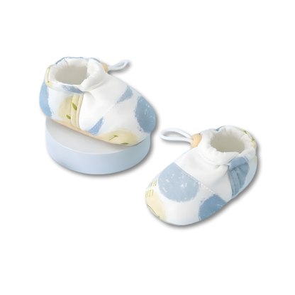 Pair of baby anti-slip booties, perfect for promoting infant stability and foot comfort.
