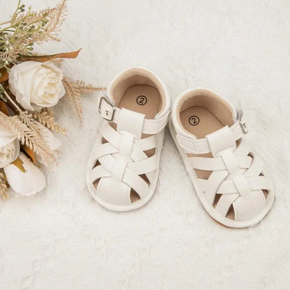Infant anti-slip soft sole sandals in a neutral color, perfect for summer