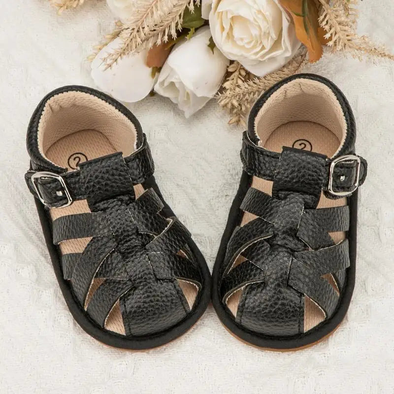 Pair of baby anti-slip sandals with a flexible soft sole for toddlers