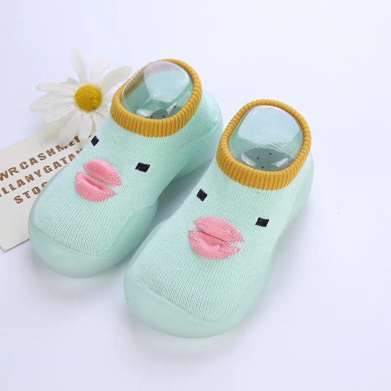 First steps soft sole baby sock shoes, providing grip and comfort for infants