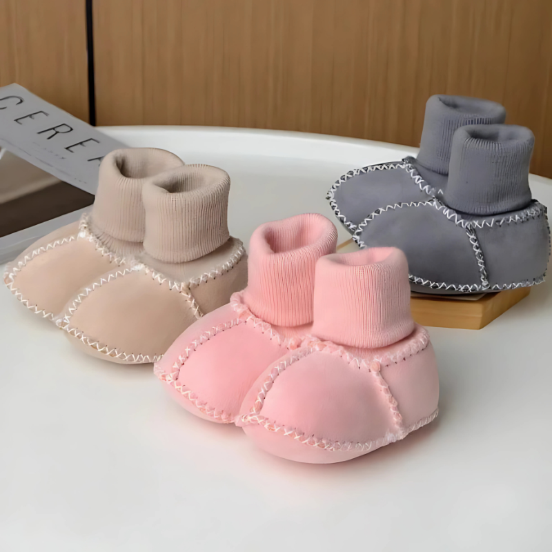 Baby anti-slip warm first walker boots, soft sole for newborns, essential infant footwear.