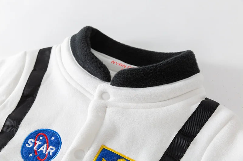 Kids dress-up astronaut romper, detailed with national flags and space agency logos