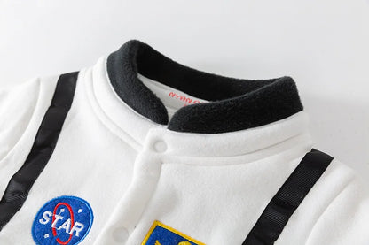 Kids dress-up astronaut romper, detailed with national flags and space agency logos