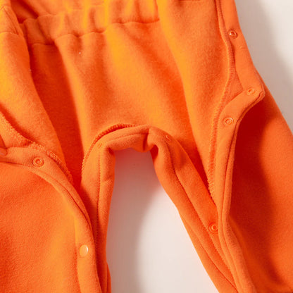Side view of infant astronaut costume romper, showing arm details and fabric texture