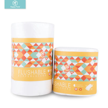 Hand holding a single Baby Bamboo Flushable Nappy Liner, showing its soft texture and eco-friendly design
