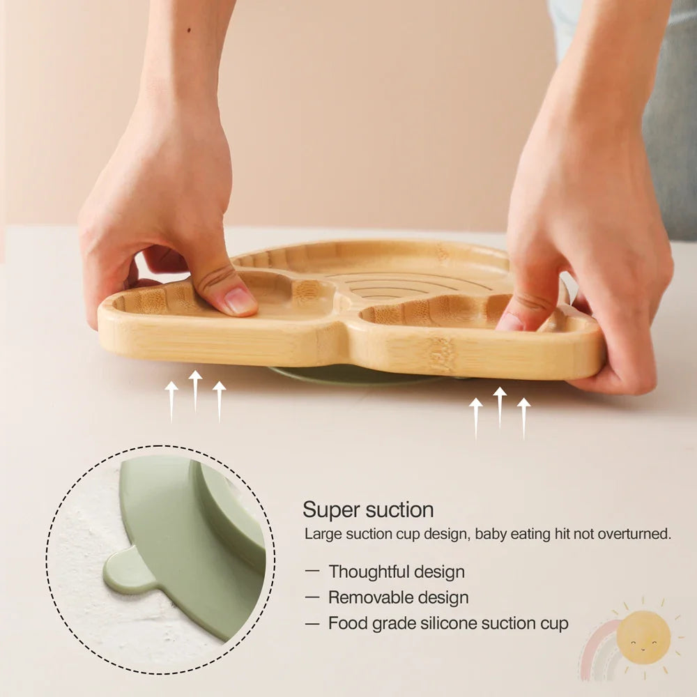 Stylish bamboo toddler bowl with strong silicone suction base, perfect for mess-free infant meals