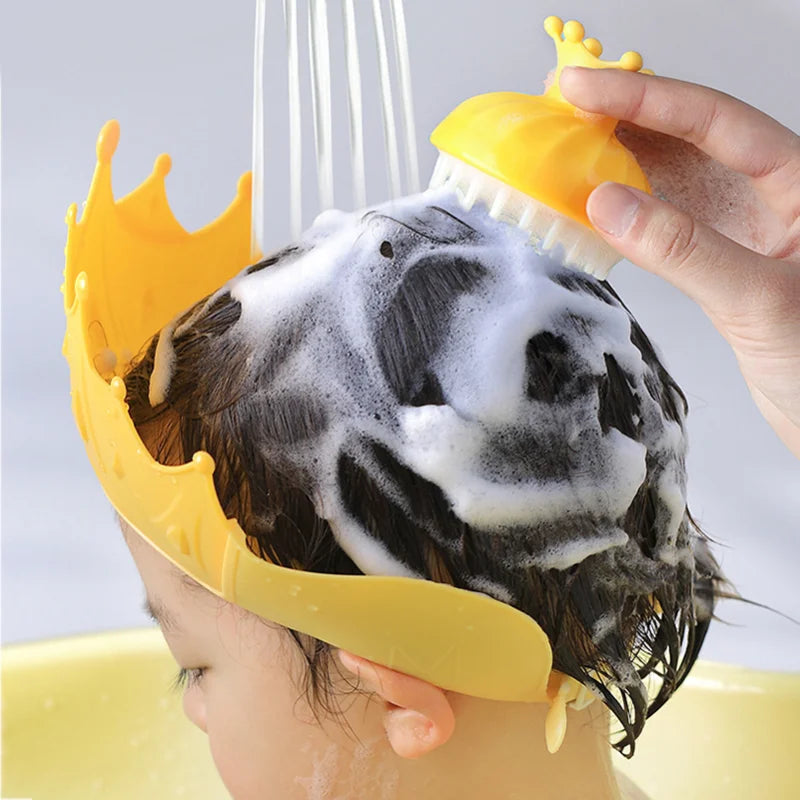 Full view of baby bath kit components: shampoo cup, brush, cap, arranged for display