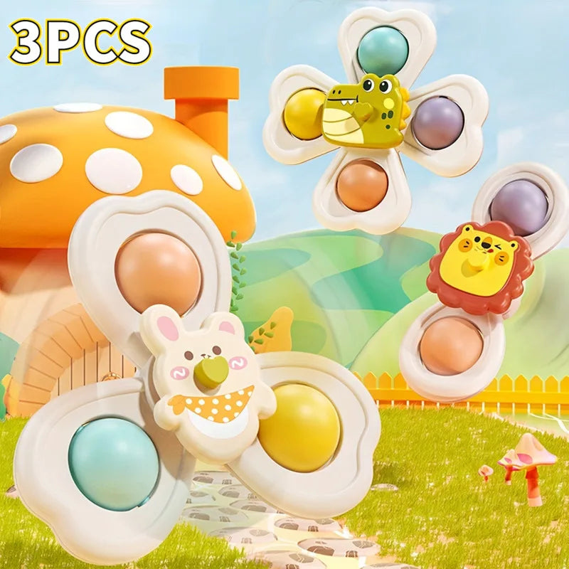 Three vibrant ABS plastic suction spinner toys for babies, perfect for bath time and infant playtime.