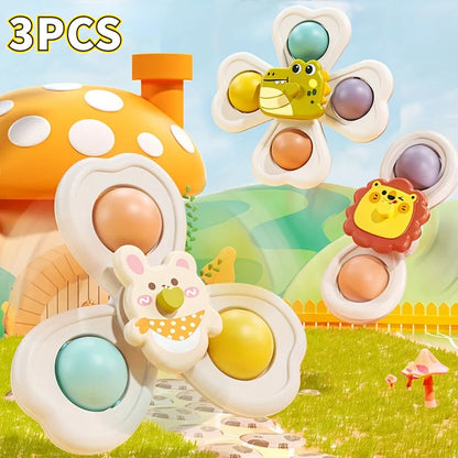 Three vibrant ABS plastic suction spinner toys for babies, perfect for bath time and infant playtime.