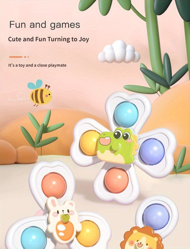 Variety of colorful suction spinner toys, shown attached to a smooth surface for playtime fun.