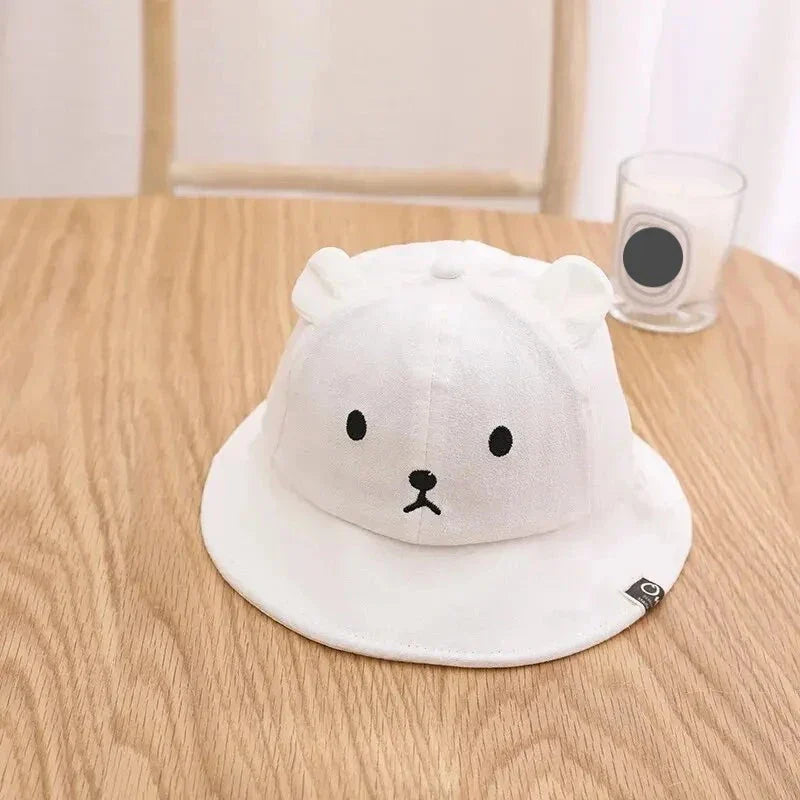 Soft cotton baby hat with bear ears, ideal for sun and style
