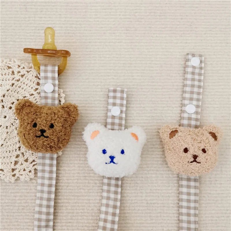Fun bear pacifier holder, helps developmental gross motor skills