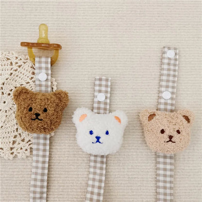 Fun bear pacifier holder, helps developmental gross motor skills