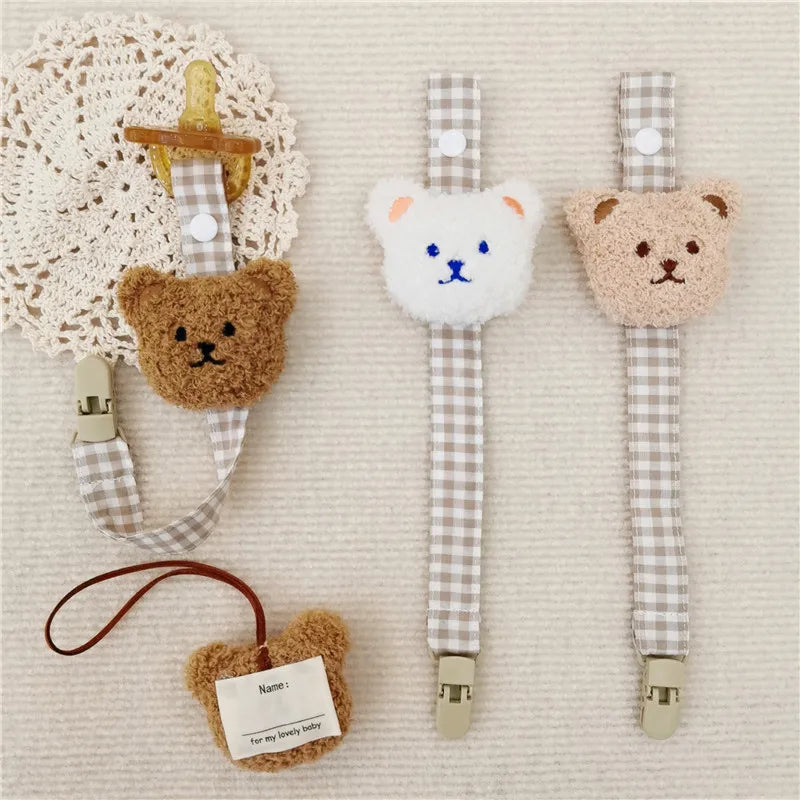 Soft silicone baby pacifier clip with charming bear design, perfect for teething relief