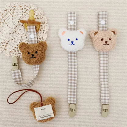 Soft silicone baby pacifier clip with charming bear design, perfect for teething relief