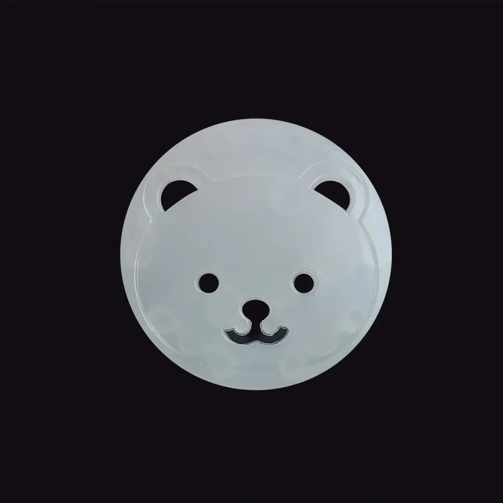Bright white ABS plastic socket covers in a cute bear design, ensuring baby proofing and home safety.