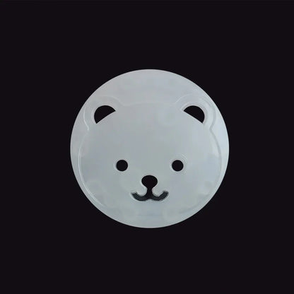 Bright white ABS plastic socket covers in a cute bear design, ensuring baby proofing and home safety.