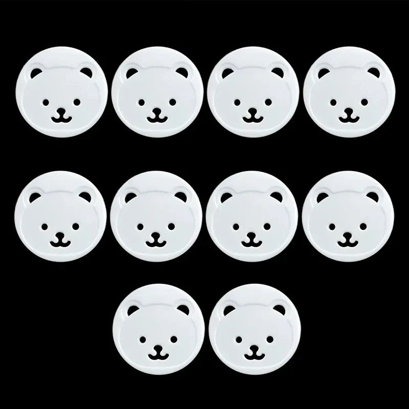 White bear design socket covers, 10 pieces, ideal for baby proofing and child electrical safety at home.