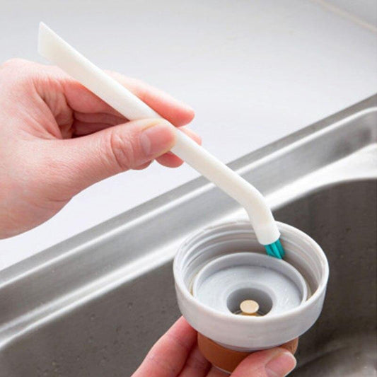 Baby bottle and nipple cleaning brush set with durable nylon bristles, ergonomic handle and compact design.