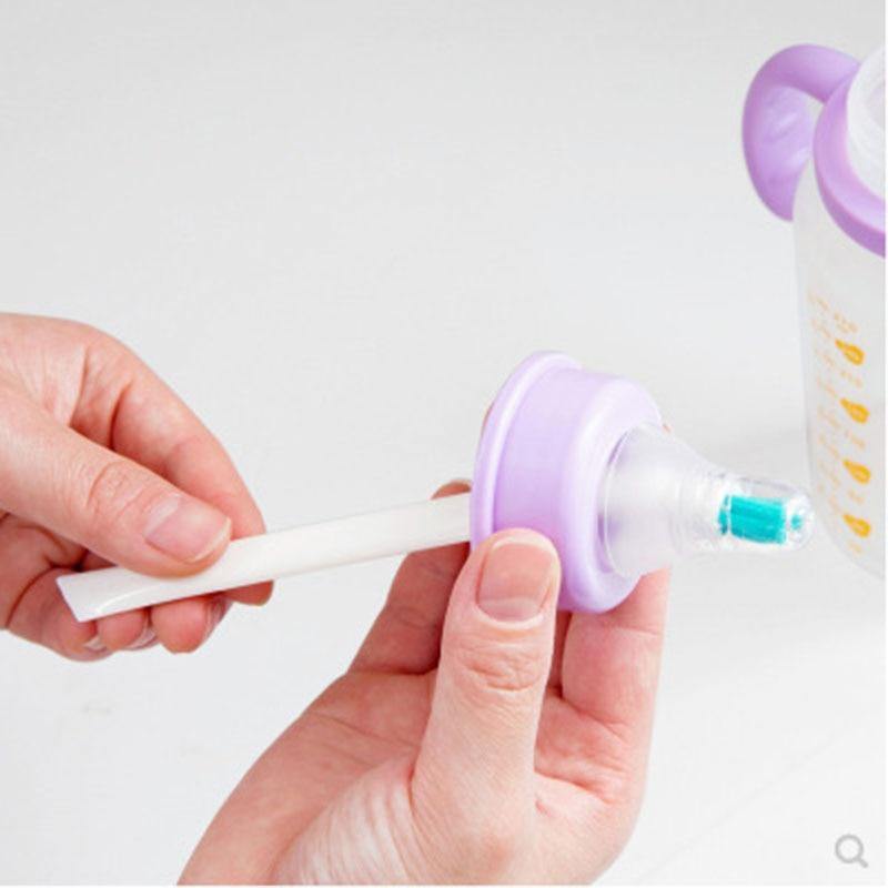 Complete baby bottle and nipple brush set for thorough cleaning, featuring a long handle brush and a small nipple brush.