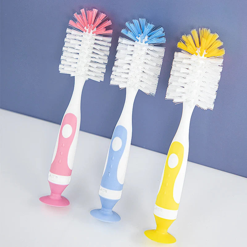 Baby bottle cleaning brush with nylon bristles and suction stand, essential for infant feeding hygiene