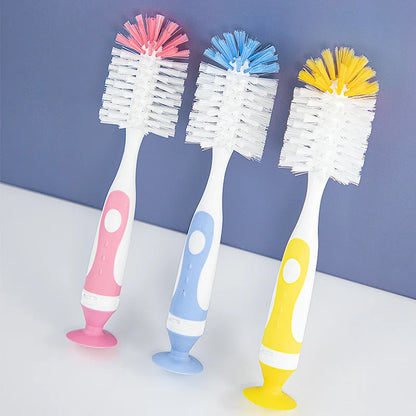 Baby bottle cleaning brush with nylon bristles and suction stand, essential for infant feeding hygiene