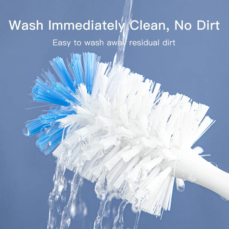 White and blue baby bottle brush with integrated suction stand, perfect for sanitary storage and drying