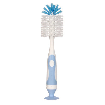 Household cleaning brush for baby bottles, equipped with a suction stand for practical upright storage