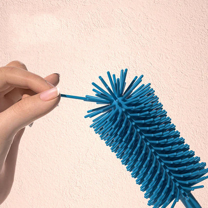 Durable silicone brush kit for baby bottles, teats, and pacifiers, ensuring complete hygiene.