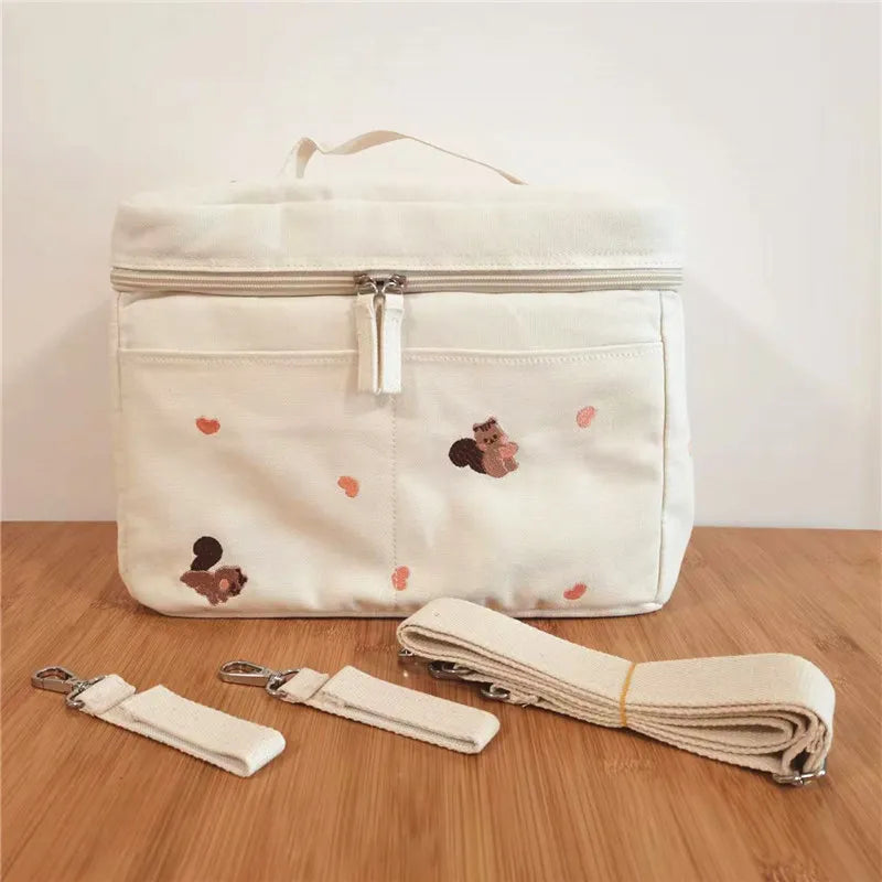 Grey baby bottle cooler bag, perfectly sized for strollers, a must-have for busy moms.