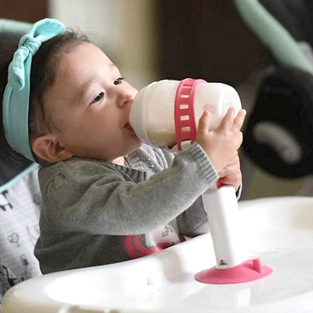 Adjustable baby bottle holder, secures bottle for hands-free feeding, a practical nursing aid.