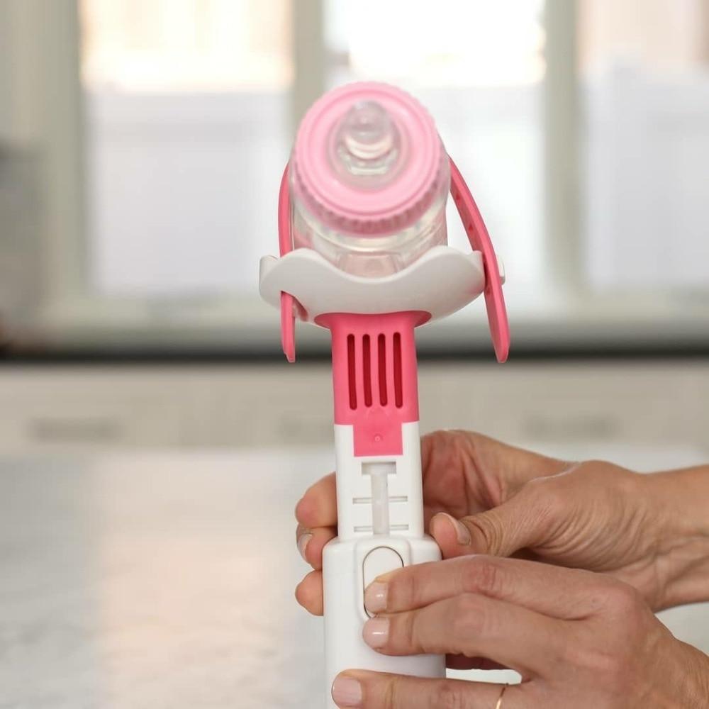 Gray baby bottle holder, hands-free, flexible and safe for infant feeding support.