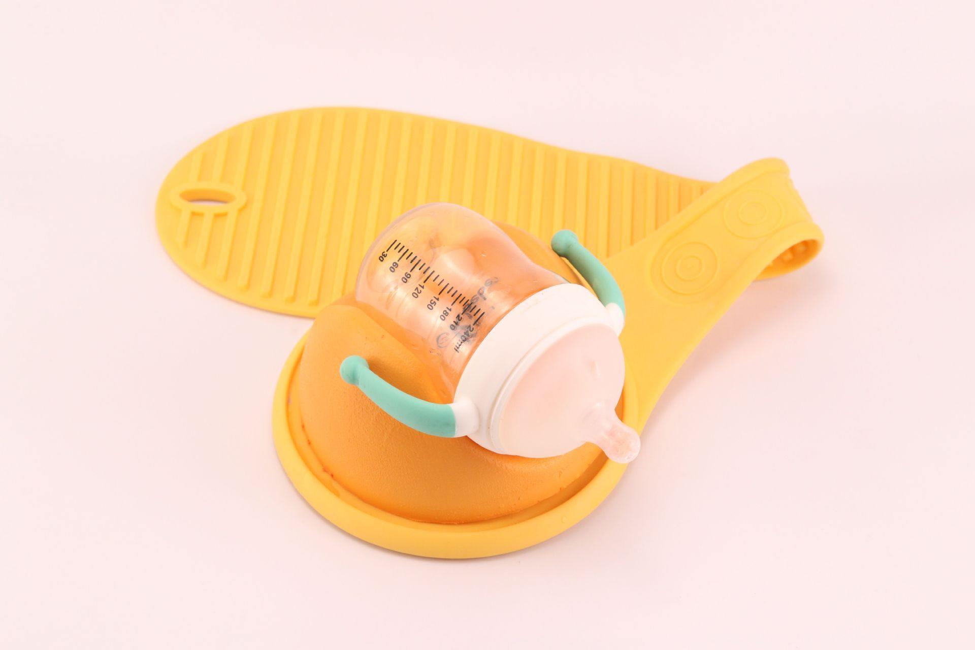Ergonomic baby bottle holder for hands-free feeding, a practical parenting solution.