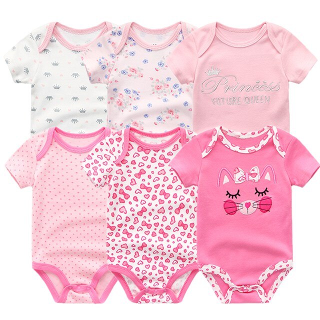 Close-up of the snap buttons on a practical baby boy cotton onesie, easy diaper changes