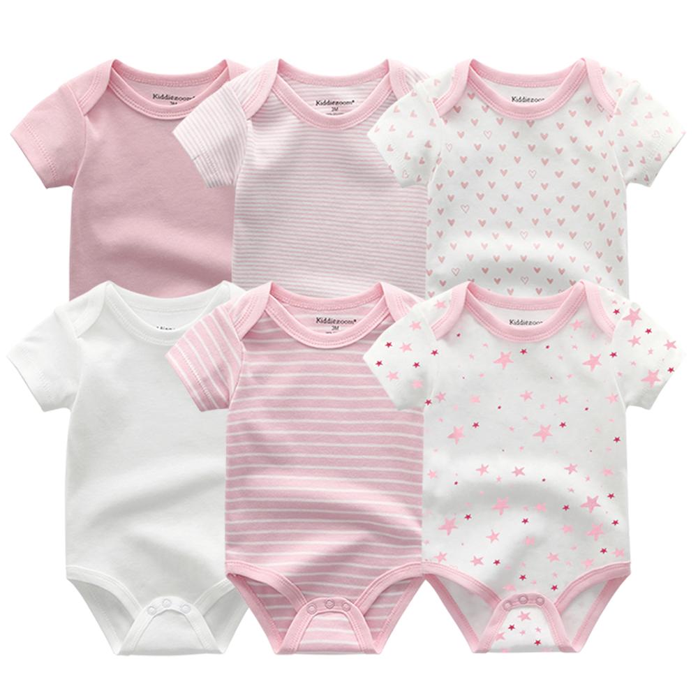Detail of the soft fabric on a baby boy cotton onesie, gentle on infant skin