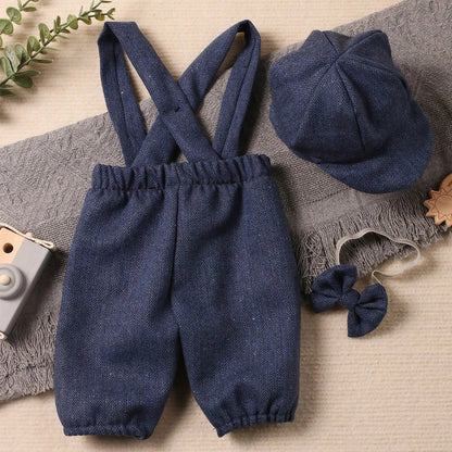 Close up of baby boy outfit's suspenders and intricate details, newborn photography prop