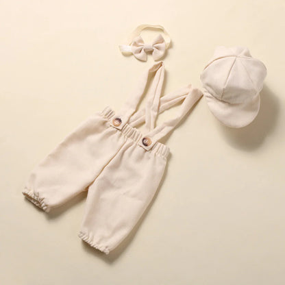 Detailed image of baby boy's suspender pants from the gentleman photography outfit