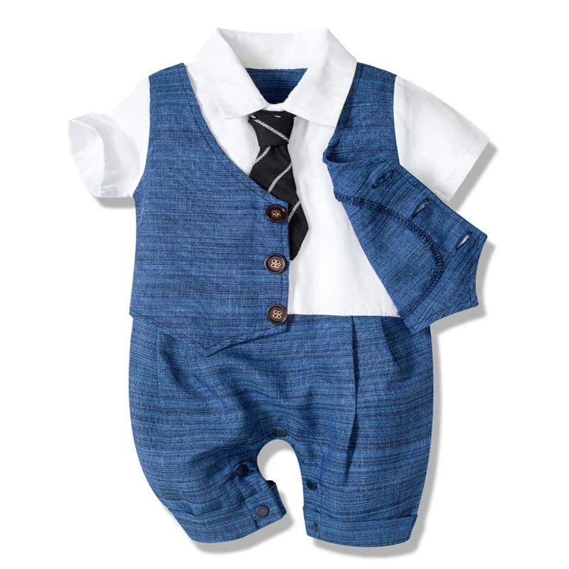 Cute navy and white cotton baby jumpsuit for boys, featuring a gentleman design with a tie.