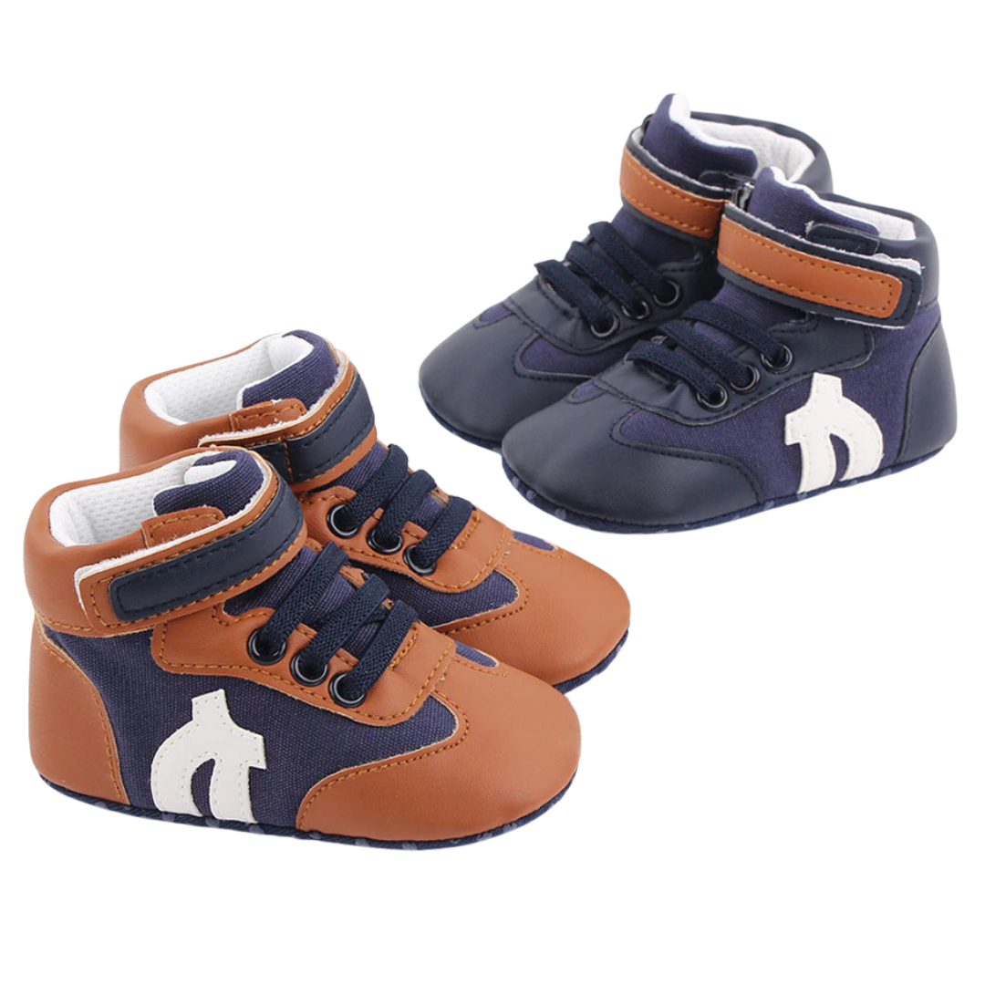 Front view of blue hi-cut baby boy sneakers, soft sole design for comfortable first steps.