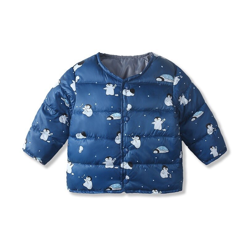 Infant wearing a yellow dinosaur winter parka, unisex baby outerwear with hood