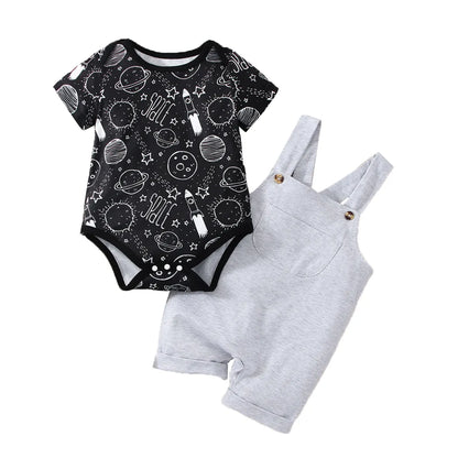 Baby boy fashion: adorable infant in blue astronaut playsuit, perfect for playtime