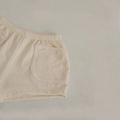 Back view of the blue cotton toddler shorts with comfortable elastic waistband