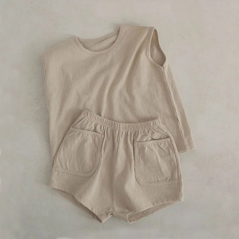 Casual baby boy summer outfit: blue cotton vest and shorts, ideal for warm weather
