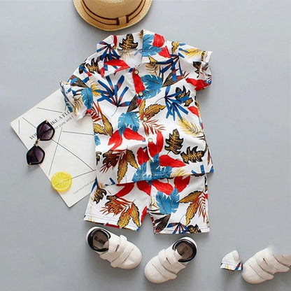 Infant boys' tropical floral tee & coordinating shorts, a comfortable cotton baby clothing set for summer.