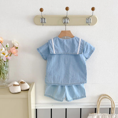 Korean style baby boy denim set, short sleeve top with sailor collar, elastic waistband shorts, flat lay
