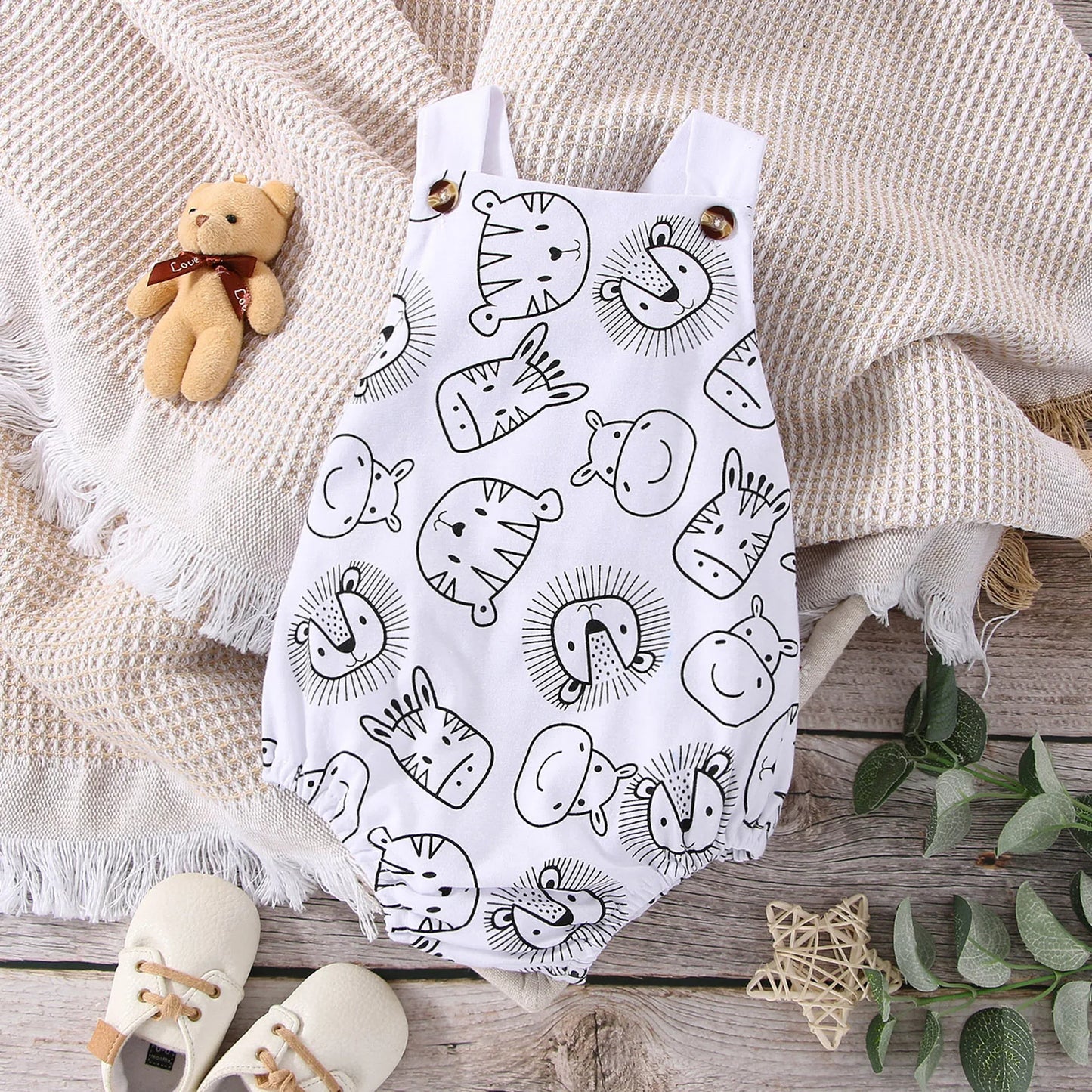Comfortable baby boy animal print one-piece, sleeveless, suitable for summer adventures.