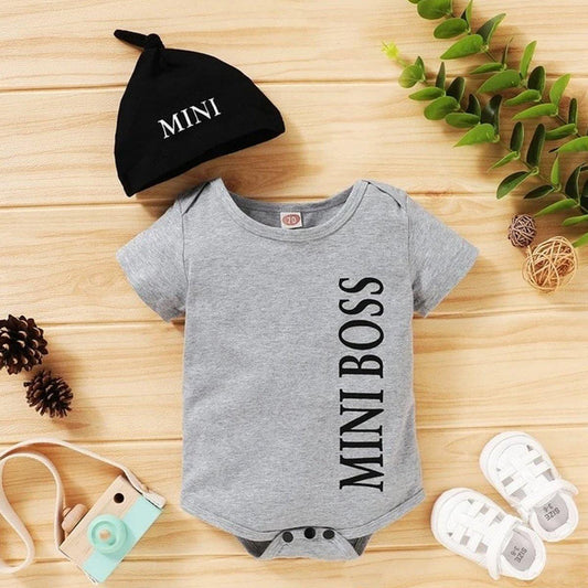Stylish baby boy overall with 'Mini Boss' text and matching cap for comfortable wear