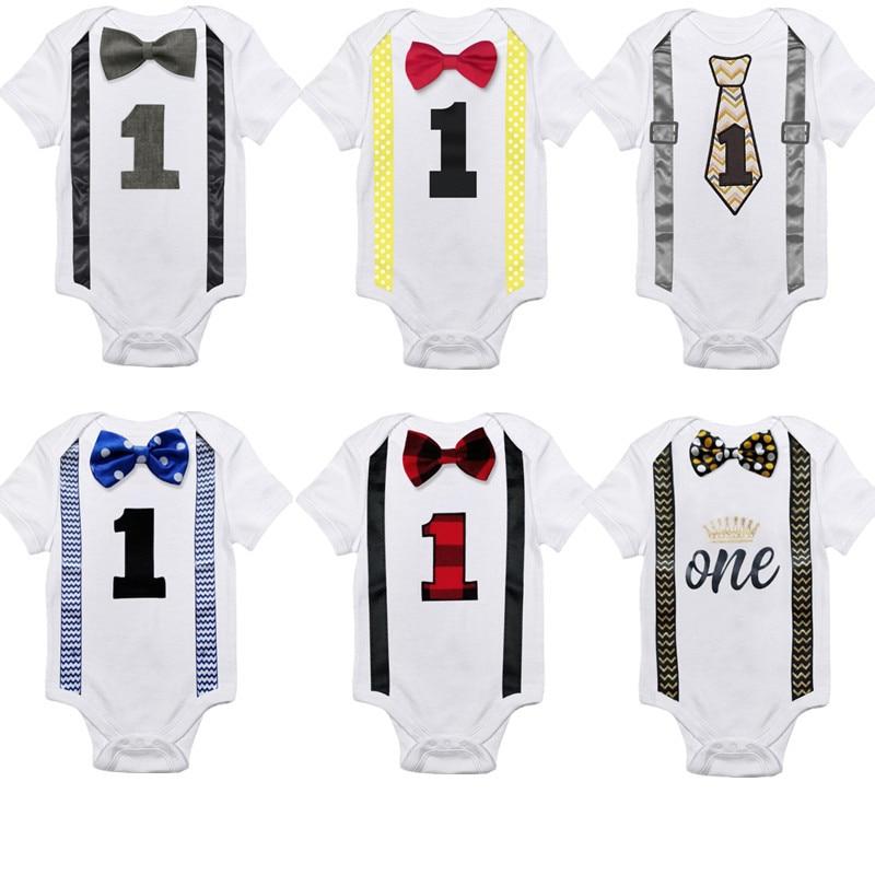 Smart cotton baby boy first birthday outfit, blue romper with check bow tie and suspenders.