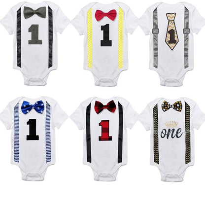 Smart cotton baby boy first birthday outfit, blue romper with check bow tie and suspenders.