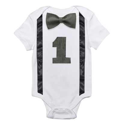 Infant party wear: baby boy 12 month bow tie romper and suspender set for special occasions.